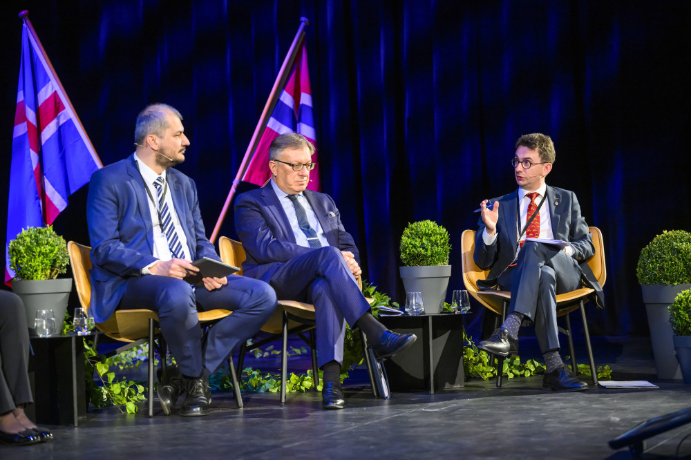 From left: Dr. Norbert Tóth, Tacan Ildem and Julian Bulai.