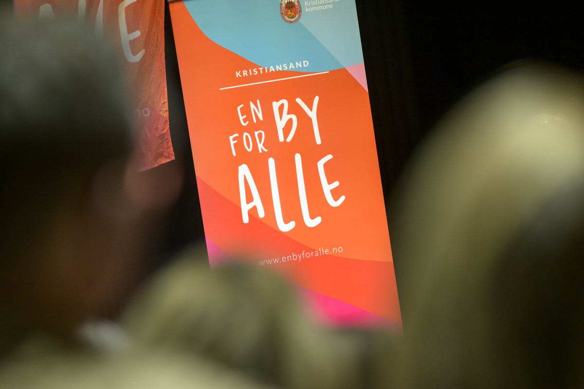 Dette er et bilde med En by for alle logo